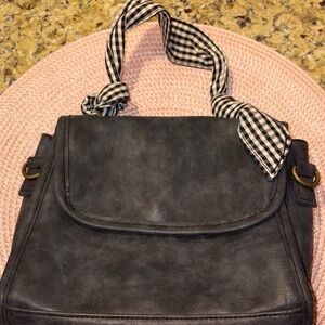 Stylish Black Handbag with Checkered Straps